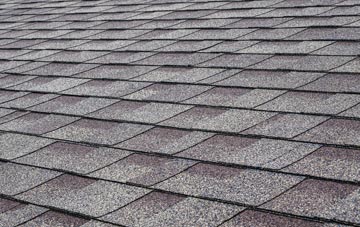 Catchall tiles for shallow pitch roofing